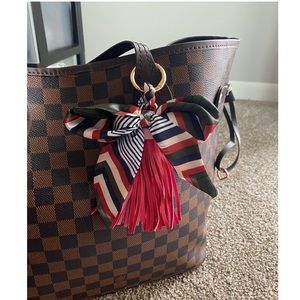 Bow knot tassel charm
